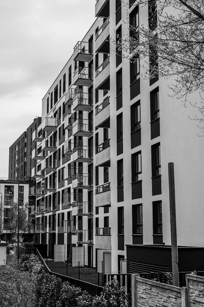 Crafting Captivating Headlines: Your awesome post title goes here Contemporary apartment buildings captured in black and white, showcasing urban architecture.